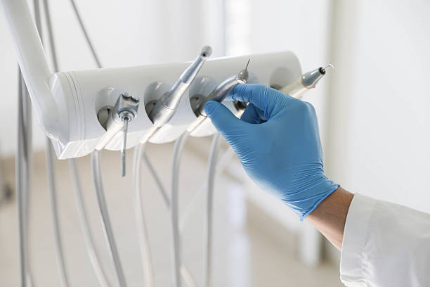 Professional Tooth Extraction technician working in Tazewell County County, IL